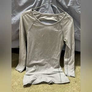 Quarter sleeve lululemon shirt with an open upper back
